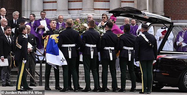 The Duke was emotional as he watched his wife's coffin be carried out after her Requiem Mass service