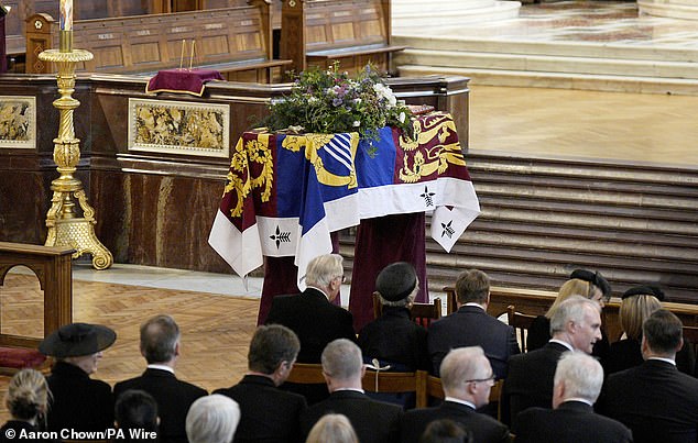 The coffin of the Duchess of Kent pictured lying during the requiem mass service this afternoon