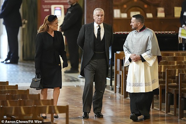 The Duke of York and Sarah Ferguson pictured arriving at the Requiem Mass service this afternoon