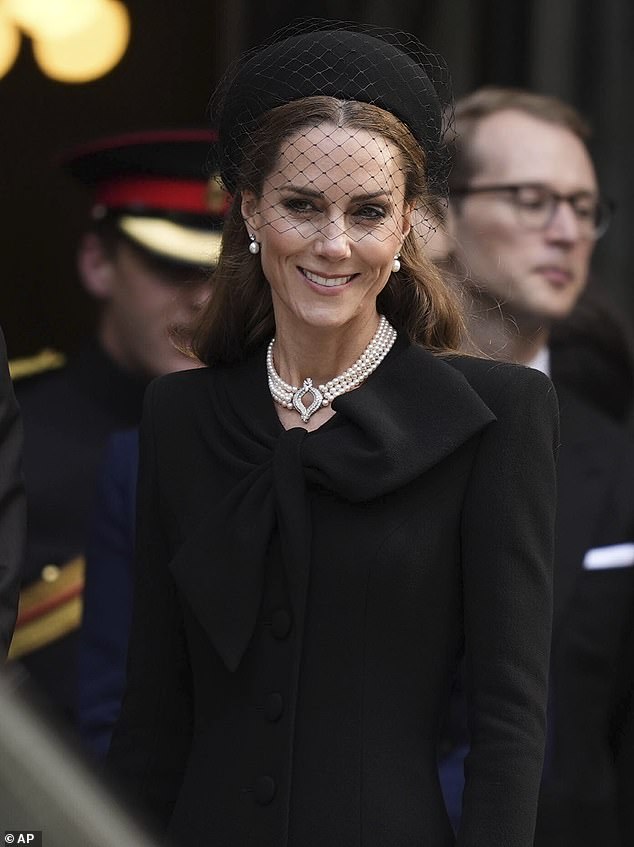 Wearing all black, the mother-of-two opted for the same dress she had donned for the late Prince Philip 's funeral