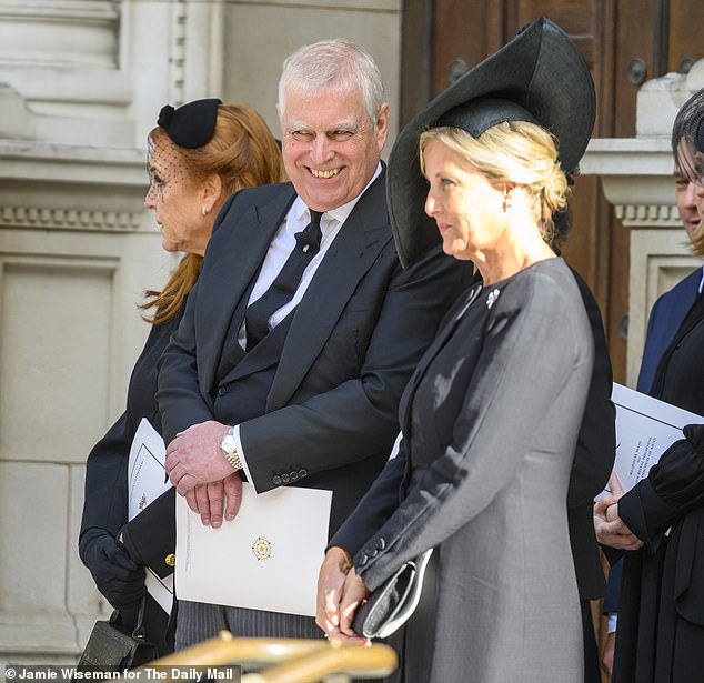 Prince Andrew appears to share a joke with the Duchess of Edinburgh at Katharine's funeral today