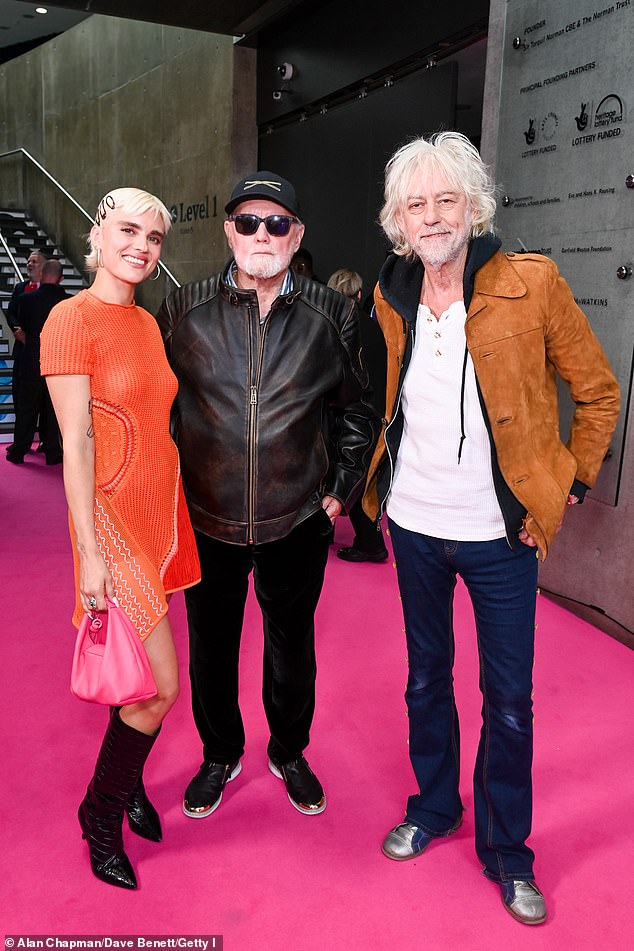 Model Tigerlily Taylor posed with her rock star dad Roger Taylor and Bob Geldof ahead of the awards