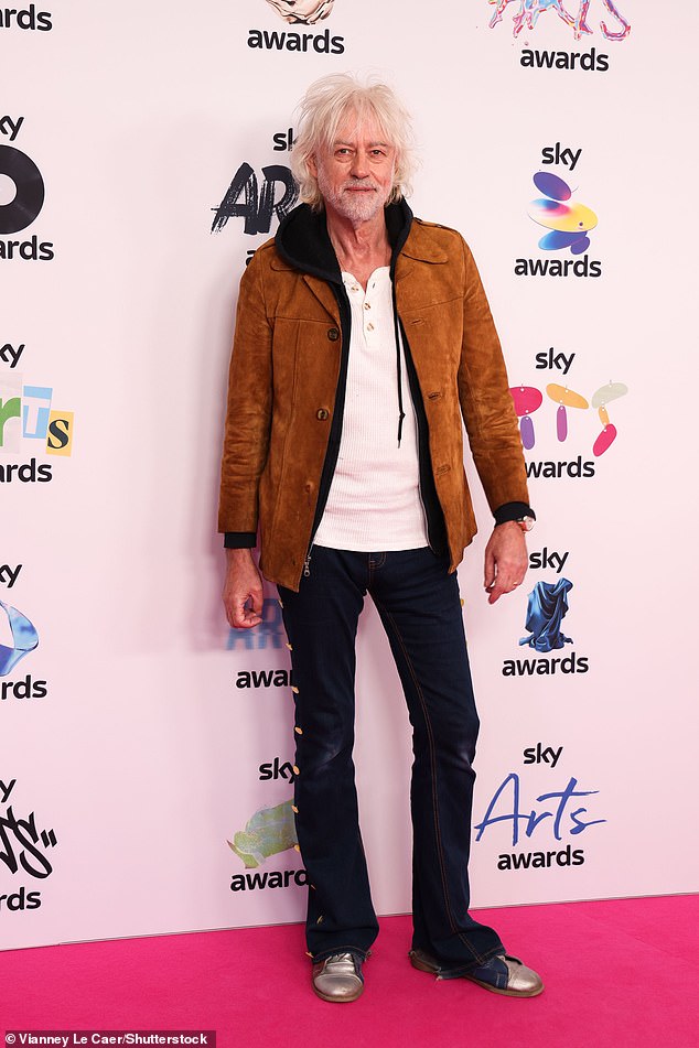 Bob opted for a suede brown jacket ad black jeans