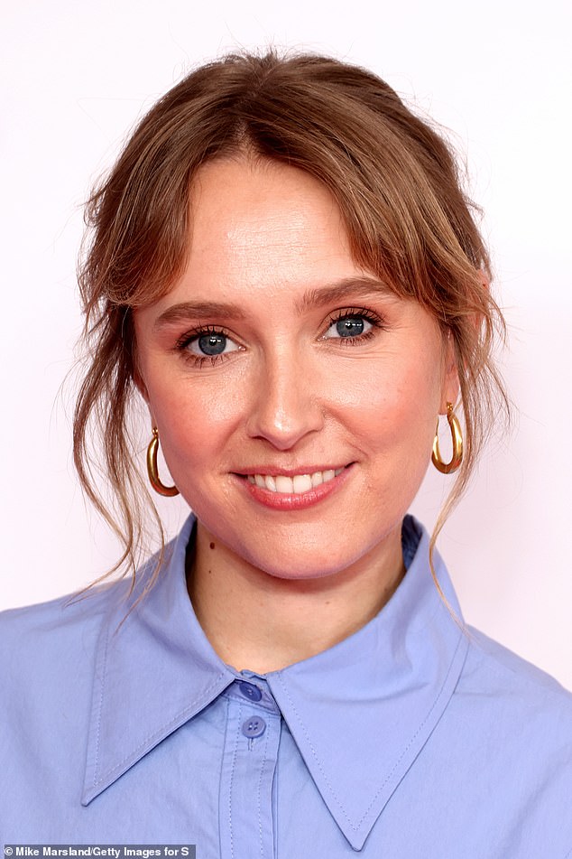 Rose accessorised with a pair of simple gold hoop earrings