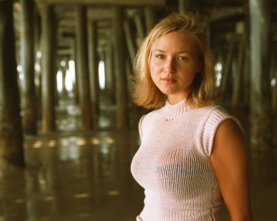 Portrait of Jewel under the Santa Monica pier.