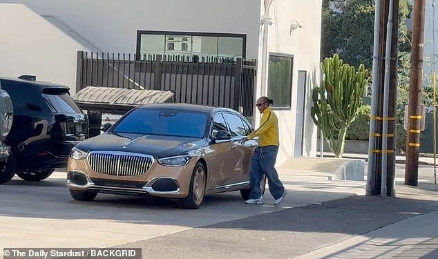 He rocked the bright yellow top and jeans for the casual outing in LA