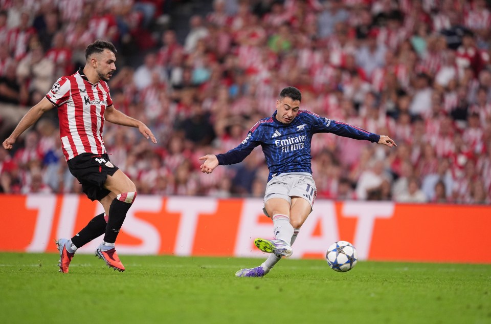 Gabriel Martinelli of Arsenal scores his team's first goal during a UEFA Champions League match.