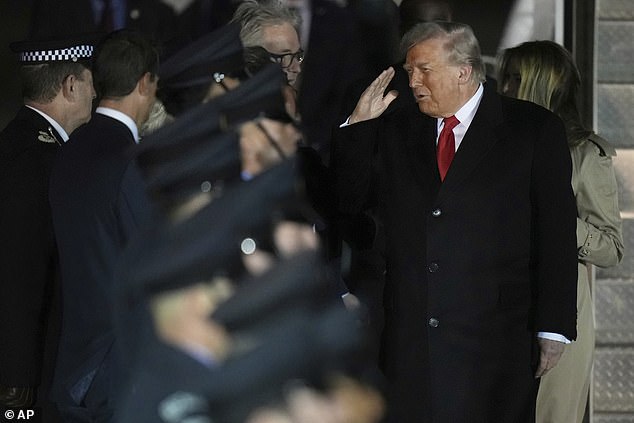 Trump salutes as he is greeted at Stansted Airport for his second state visit