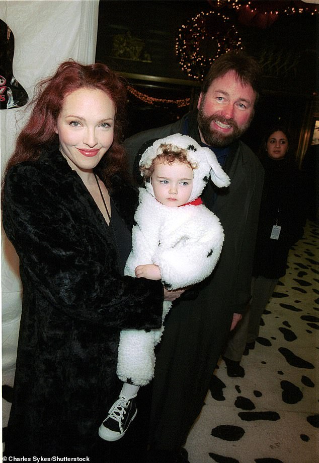 Amy and John with child Stella in 2000