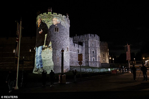 Images of Prince Andrew and the disgraced financier were also broadcast along the wall of Windsor Castle