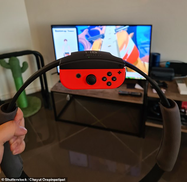 While using the game's resistance band for overhead exercises, the sedentary woman suddenly experienced a sharp pain in her neck