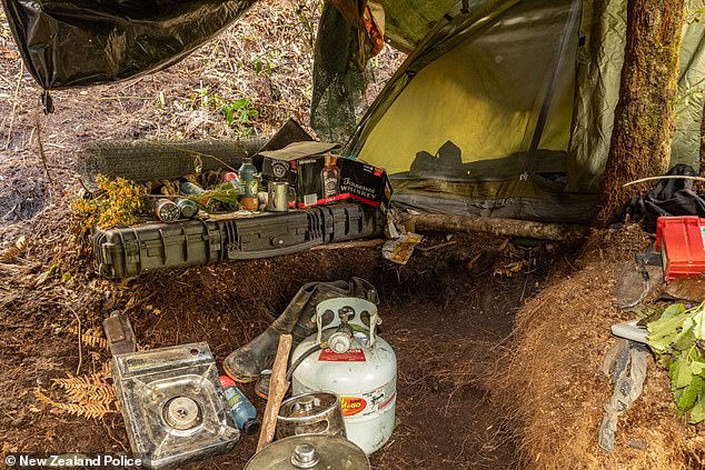 Items found at the site include gas bottles, drink containers, and cooking equipment