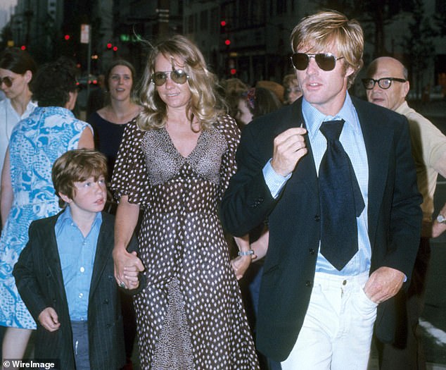 Redford and Lola had four children: sons Scott and Jamie and daughters Shauna and Amy. Their son Scott died from SIDS at just 10 weeks old. The couple are seen with their son Jamie