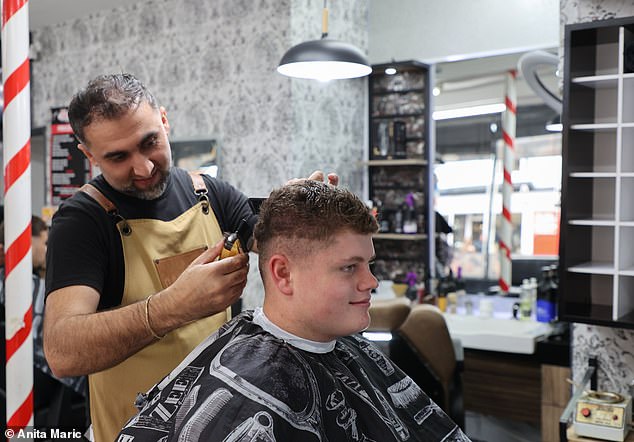The 17-year-old has reunited with his barber for a first haircut since taking his life-saving advice