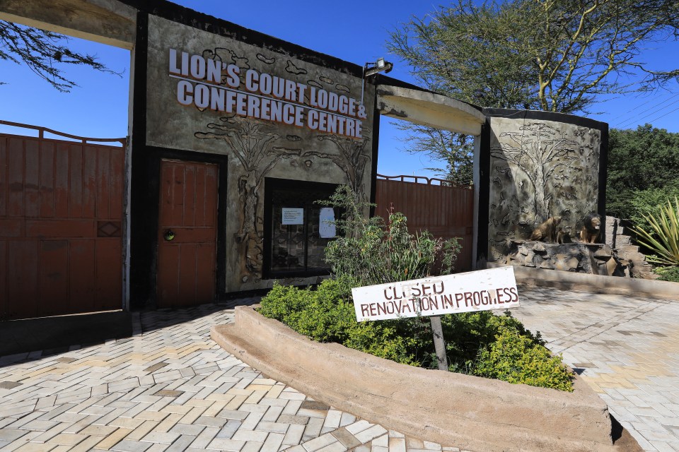 The main entrance of Lion's Court Lodge and Conference Centre, with a sign indicating "Closed, Renovation in Progress."