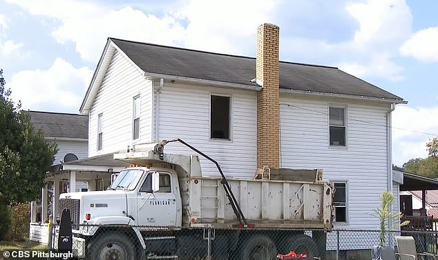When he visited the home (pictured) two weeks later to change the locks, he noticed belongings left behind and abandoned cats