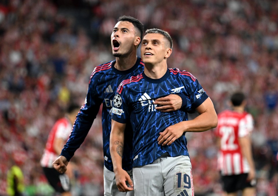Leandro Trossard celebrates scoring Arsenal's second goal with Gabriel Martinelli.