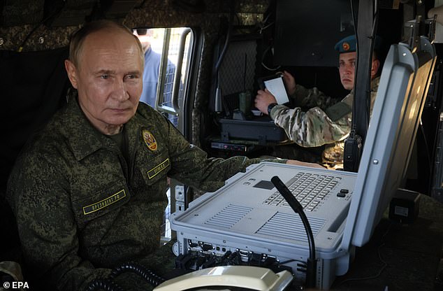 The last time Putin donned uniform in March 2025 he was derided with commenters claiming it was a body doubl
