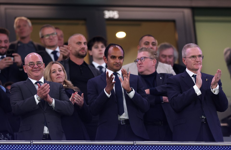 Vinai Venkatesham, CEO of Tottenham Hotspur, applauds during a soccer match.