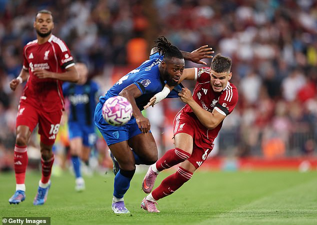 Kerkez battles with Antoine Semenyo of Bournemouth on a tricky night for the full back