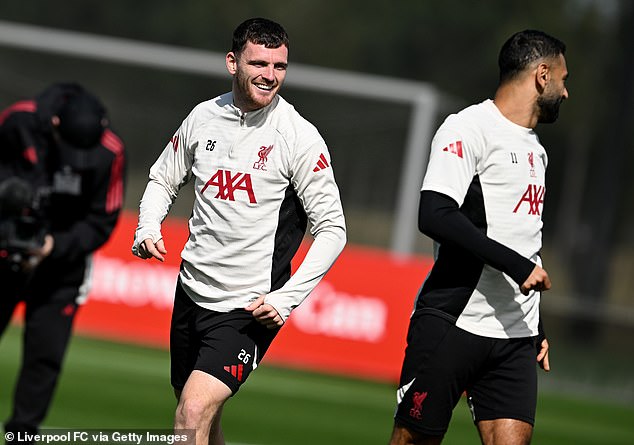 But Liverpool legend Robertson (left) will offer stiff competition to the Hungarian at left back