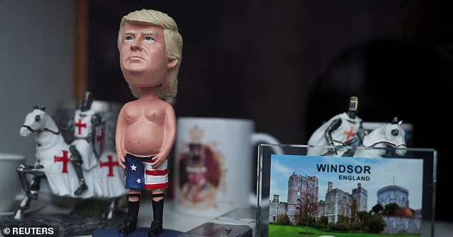 A figurine of U.S. President Donald Trump trump is displayed for sale in the window of a souvenir shop on the day of the state visit of U.S. President Donald Trump and First Lady Melania Trump to the UK, in Windsor, Britain, September 17, 2025. REUTERS/Phil Noble
