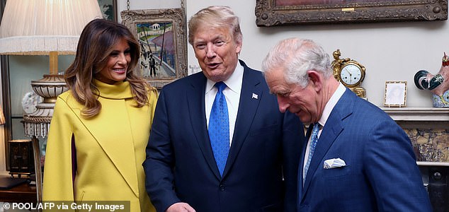 (FILES) Britain's Prince Charles, Prince of Wales (R), US President Donald Trump (C) and US First Lady Melania Trump (L) talk as they pose for photographs at Clarence House in central London on December 3, 2019, ahead of the NATO alliance summit. US President Donald Trump arrives in the UK late September 16, 2025 for a state visit with his wife, Melania -- a rare privilege made at the invitation of King Charles III. These pomp-filled visits are organised at the recommendation of the government to strengthen diplomatic, trade or personal relations with certain countries and their leaders. Trump is the first president ever to be invited for a second state visit, having been hosted by Queen Elizabeth II in 2019, during his first White House term. (Photo by Chris Jackson / POOL / AFP) (Photo by CHRIS JACKSON/POOL/AFP via Getty Images)