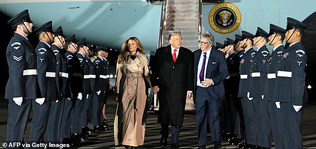 US President Donald Trump (C) and US First Lady Melania Trump disembark from Air Force One after landing at Stansted Airport, eastern England, on September 16, 2025, on the first day of a two-day visit to the UK. US President Donald Trump arrived in the UK late Tuesday for a State Visit with his wife, Melania, a rare privilege made at the invitation of King Charles III. (Photo by ANDREW CABALLERO-REYNOLDS / AFP) (Photo by ANDREW CABALLERO-REYNOLDS/AFP via Getty Images)