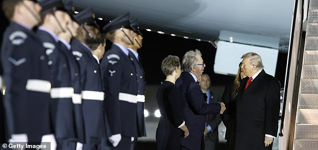 STANSTED, ESSEX - SEPTEMBER 16: U.S. President Donald Trump and First Lady Melania Trump is greeted by Viscount Hood, Lord-in-Waiting and Britain's Foreign Secretary Yvette Cooper as they exit Air Force One after arriving at London Stansted Airport for a state visit on September 16, 2025 in Stansted, Essex. President Trump is in England from Sept. 16-18 on his second UK state visit, with the previous one taking place in 2019 during his first presidential term. (Photo by Anna Moneymaker/Getty Images)