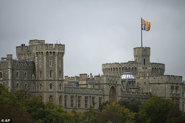Security forces stand on the roof of Windsor Castle today ahead of President Trump's arrival