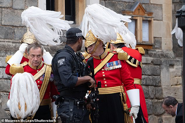 Members of the Honourable Corps of Gentlemen at Arms at Windsor Castle this morning