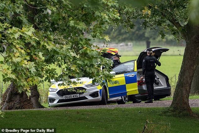 Police officers patrol in Windsor this morning as the state visit gets underway