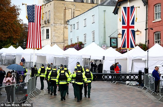 Police officers patrol in Windsor this morning as the state visit gets underway