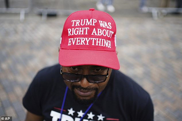 Trump supporter Augustine Chukwuma Obodo outside Windsor Castle this morning