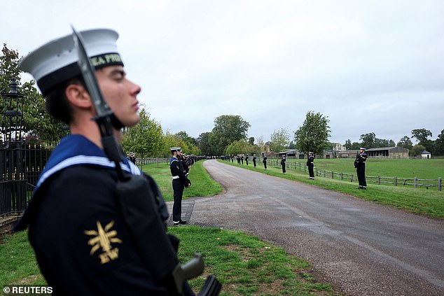 The Royal Navy Ceremonial Guard line up on the carriage procession route in Windsor today