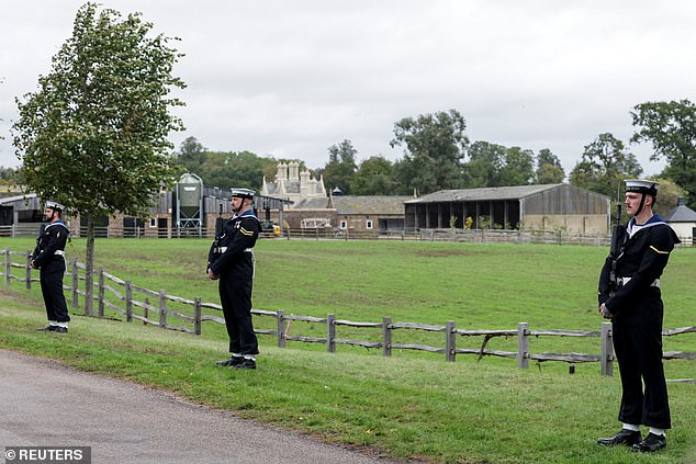 The Royal Navy Ceremonial Guard line up on the carriage procession route in Windsor today
