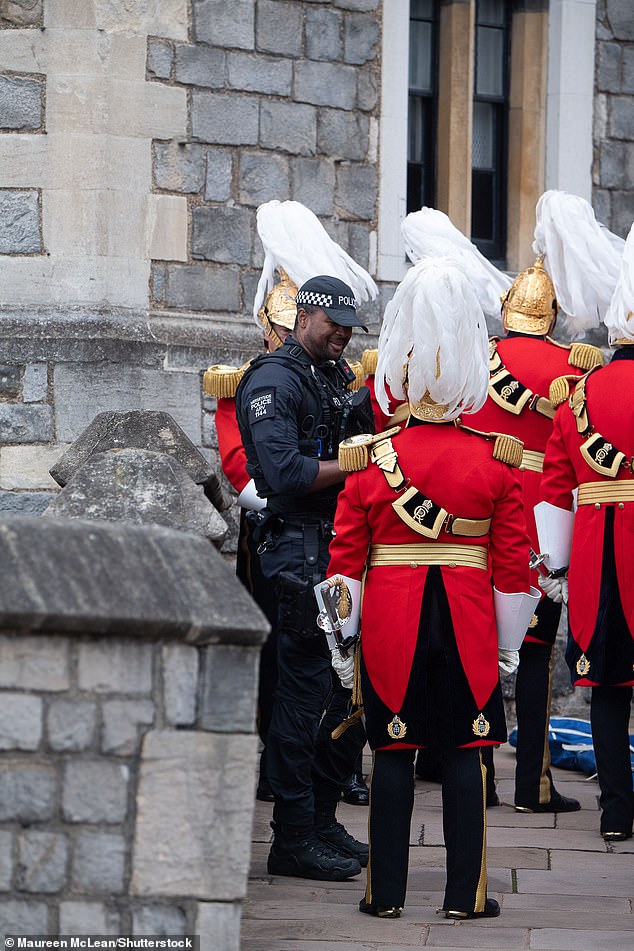 Members of the Honourable Corps of Gentlemen at Arms at Windsor Castle this morning