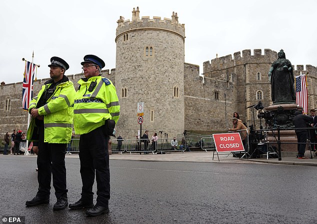 Police officers patrol in Windsor this morning as the state visit gets underway