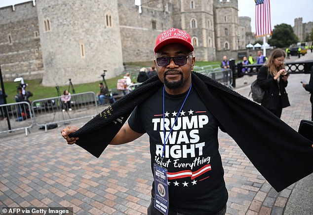 Trump supporter Augustine Chukwuma Obodo outside Windsor Castle this morning