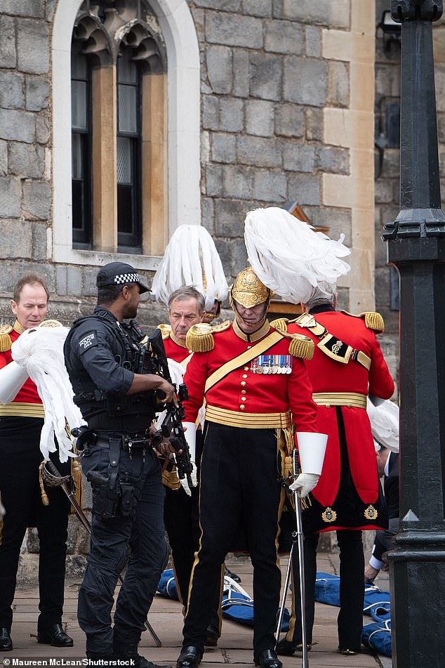 Members of the Honourable Corps of Gentlemen at Arms at Windsor Castle this morning