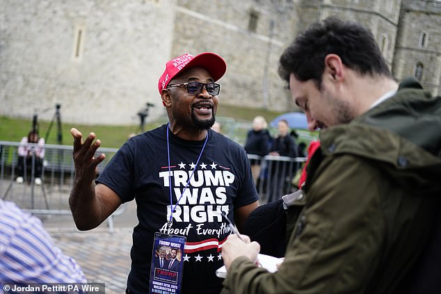 Trump supporter Augustine Chukwuma Obodo outside Windsor Castle this morning