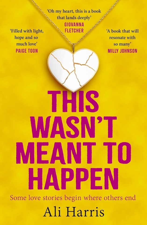 Book cover for "This Wasn't Meant To Happen" by Ali Harris; features a cracked heart pendant.