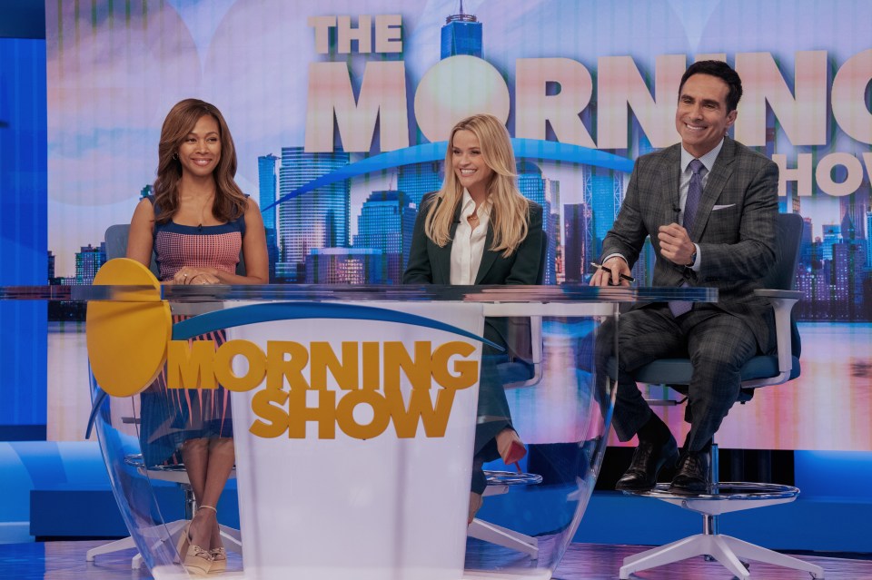 Nicole Beharie, Reese Witherspoon, and Nestor Carbonell on The Morning Show set.