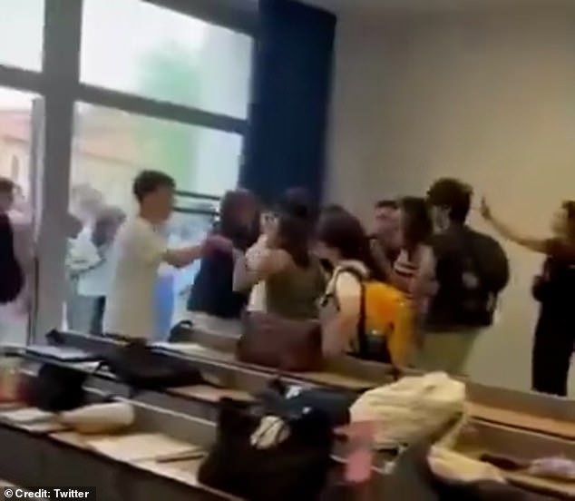 A student who stepped in to try and defend the professor was also attacked by the angry mob