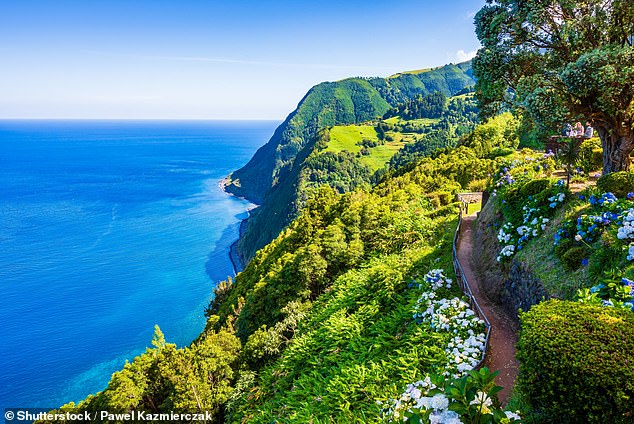Walk the coastal path through the Ponta do Sossego tropical gardens on São Miguel island
