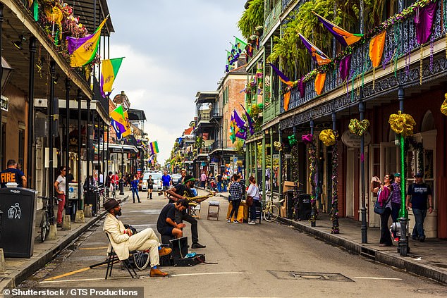 A jazz band brings live music to the colourful streets in the French Quarter of New Orleans