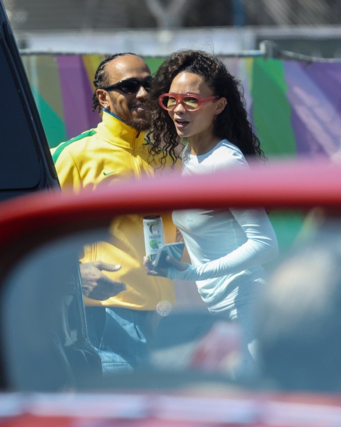 BGUK_3354927 - *EXCLUSIVE* Los Angeles, CA WEB MUST CALL FOR PRICING - Rocking in his Nike Brazilian Football Jacket, the Former F1 champ Lewis Hamilton was spotted out and about in Los Angeles, cruising through the city in his ultra-rare Virgil Abloh-designed Mercedes-Benz  but it wasnt just the car catching eyes. The racing icon who currently stands 6th in the F1 championship with his new team Ferrari was seen running errands and deep in conversation with model Ashley Moore. Pictured: Lewis Hamilton, Ashley Moore BACKGRID UK 15 SEPTEMBER 2025 BYLINE MUST READ: The Daily Stardust / BACKGRID UK: +44 208 344 2007 / uksales@backgrid.com USA: +1 310 798 9111 / usasales@backgrid.com *Pictures Containing Children Please Pixelate Face Prior To Publication*