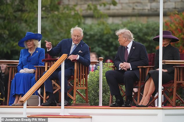 During the performance, King Charles appeared to lean over to Mr Trump and point at the band as they marched out