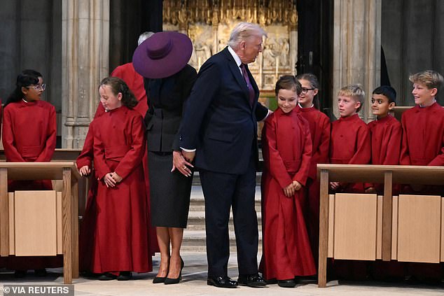 Mr Trump and First Lady Melania were later treated to a musical performance from Choristers of St George's Chapel choir before posing for photos with the youngsters