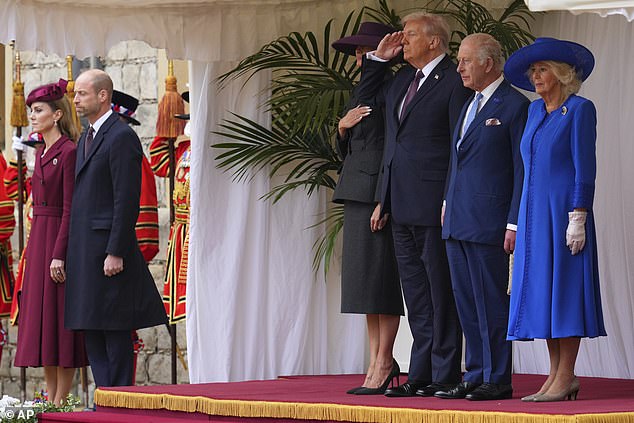 President Donald Trump salutes as he stands beside King Charles III and Queen Camilla with Melania Trump on the left as Kate and Prince William listen on the far left at Windsor Castle